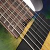 Cort-elektromos-gitar-8-huros-Multi-Scale-tengerke